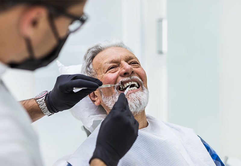 A patient in the dental chair during an implant consultation